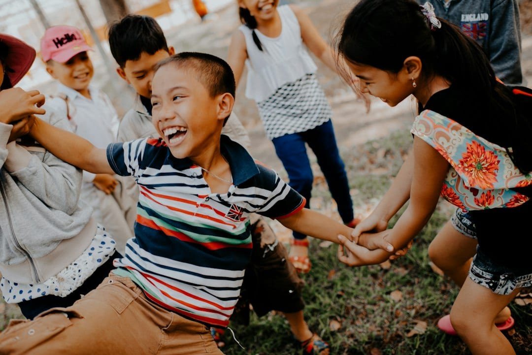 Diverse children collaborating in team roles