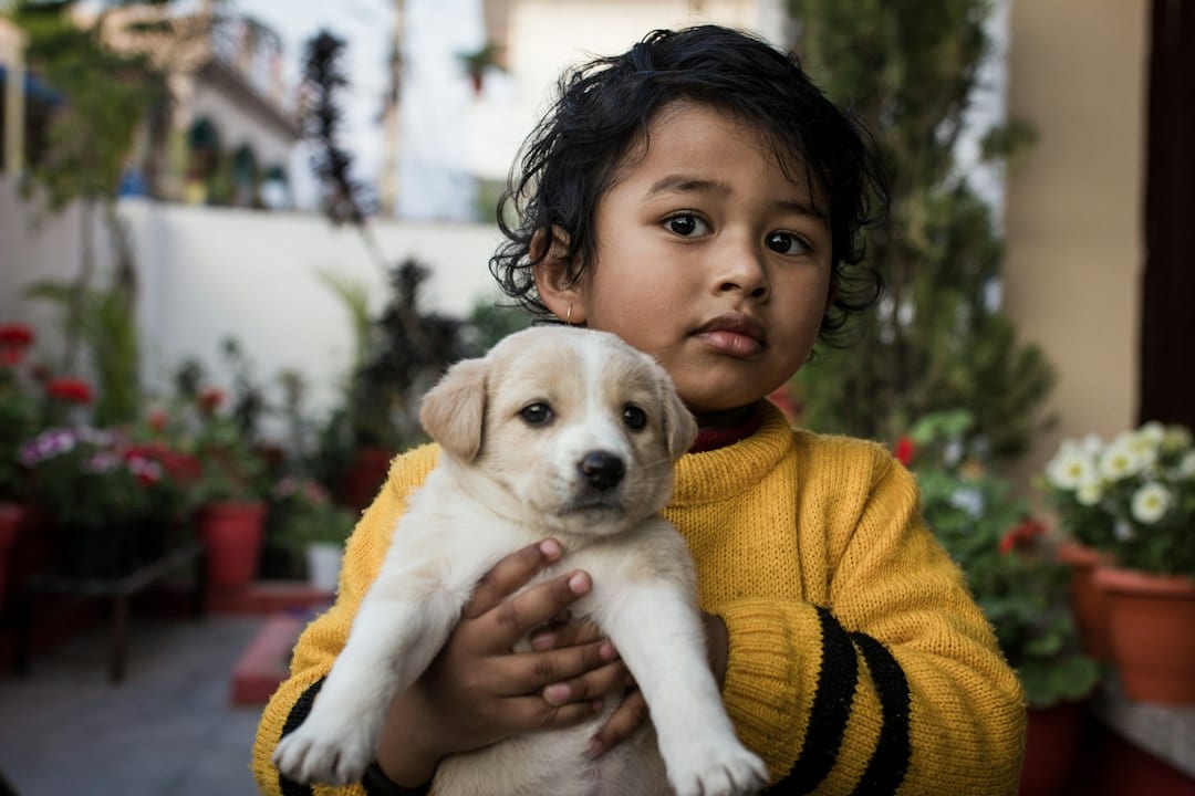 Young entrepreneur caring for a puppy